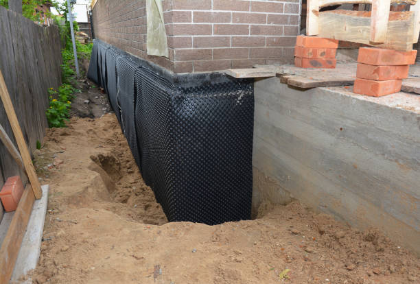 SJ Waterproofing Pros technician performing targeted Waterproofing assessment in Hartford, KY